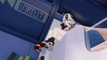 a girl is sitting in front of a sign that says unit