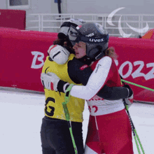 hugging paralympics emotional crying embrace