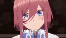 a girl with pink hair and blue eyes is wearing headphones and making a face .