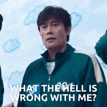 a man in a green jacket with the number 301 on it says " what the hell is wrong with me "