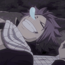 a person with purple hair is laying down with a tear coming out of his nose