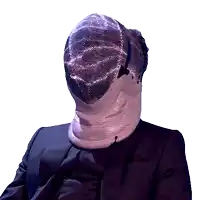 a man in a suit is wearing a fencing mask on his face