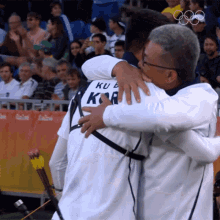 Hugging Ku Bonchan GIF - Hugging Ku Bonchan Olympics GIFs