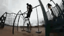 a person is riding a bicycle on a playground .