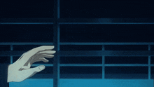 a person 's hand is reaching out towards another person 's hand