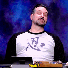 a man wearing a t-shirt that says yeah