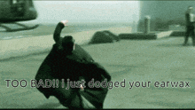 a man in a black cape says " too bad ! i just dodged your earway "