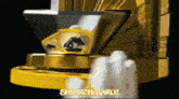 a close up of a gold object with the words shinkenmaru written on it