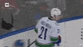 a hockey player with the number 21 on their jersey