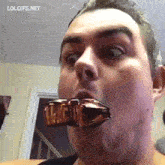 a man with a lol gifs.net watermark on the bottom of his face