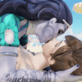 a woman with a tattoo on her arm is kissing a man on the beach