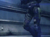 a person in a purple armor is standing in a dark room
