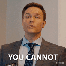 a man in a suit and tie says " you cannot " in front of a netflix logo