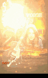 a picture of a woman holding a guitar with the words voice written above her