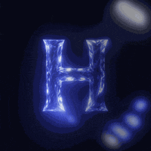 the letter h is glowing in the dark with a blue background