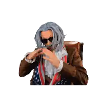 a man in a wig and sunglasses holds his head