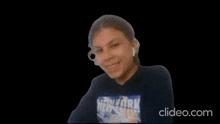 a blurry picture of a person holding a piece of paper in their hand .