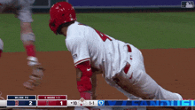 wilson and moore are playing a baseball game and wilson is sliding into base