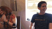 a man wearing a shirt that says " more funin " on it
