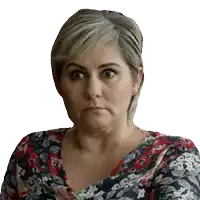 a woman wearing a floral shirt makes a surprised face