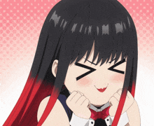 a girl with black and red hair is making a face