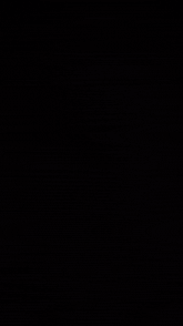 a dark background with a lot of gold sparkles