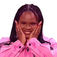a woman wearing a pink jacket with her hands on her face