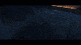 a computer generated image of a racing car going down a track