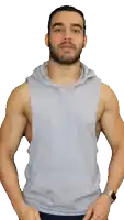 a man with a beard wearing a sleeveless hoodie
