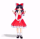 a girl in a red and white dress with a red bow on her head