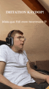 a man wearing headphones is sitting in front of a computer screen with the words imitation kaydop written above him