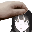 a hand is holding a picture of a girl 's face .