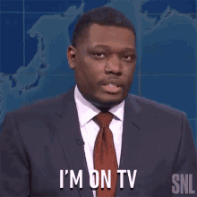 im on tv saturday night live im live on tv im being shown in the television michael che