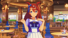 a girl in a purple and white dress stands in a restaurant