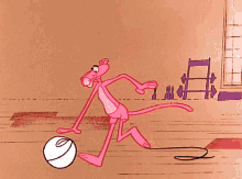 pink panther dribbling a ball dribbles basketball the little man cartoon