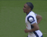 a soccer player wearing a jersey with the number 11 on it