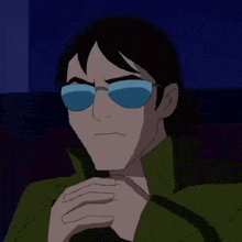 a man wearing sunglasses and a green jacket is making a funny face