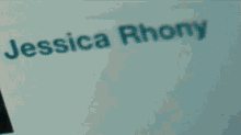 a close up of a person 's face with the name jessica rhony