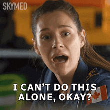 a woman says " i can 't do this alone okay " in front of a canadian flag