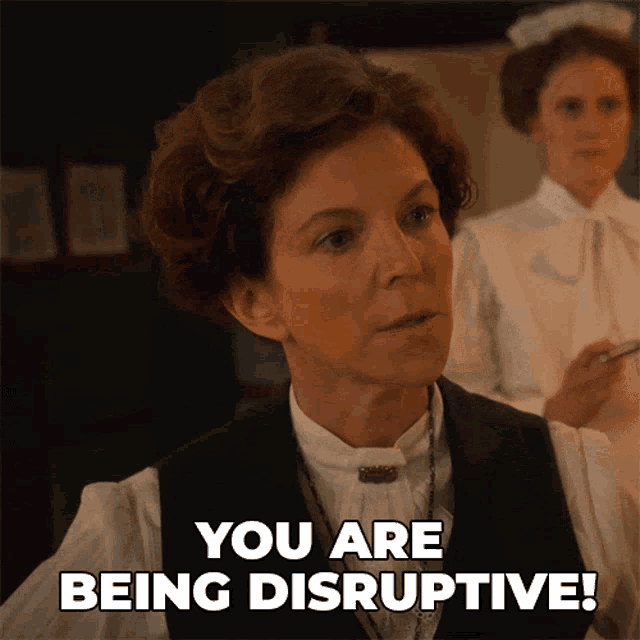 Lady saying "You are being disruptive"