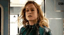 Marvel Captain Carol Danvers GIF - Marvel Captain Carol Danvers Seriously Annoyed Hair From Your Face GIFs