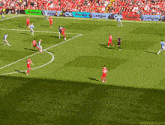a soccer game is being played on a field with advertisements for premier league