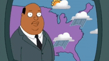 a man in a suit and tie stands in front of a weather map