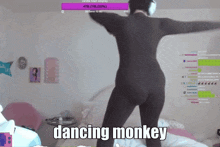 a dancing monkey is displayed on the screen of a person