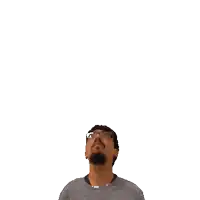 a man looking up at the number 12