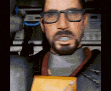 a man with glasses and a beard is holding something in his hand