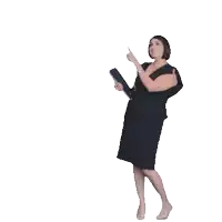 a woman in a black dress is pointing up