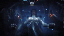 a close up of a robot 's body in a video game in a dark room .