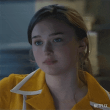 a close up of a woman 's face with the words netflix on the bottom