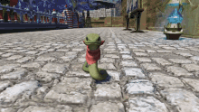 a snake with a red scarf around its neck is standing on a cobblestone street